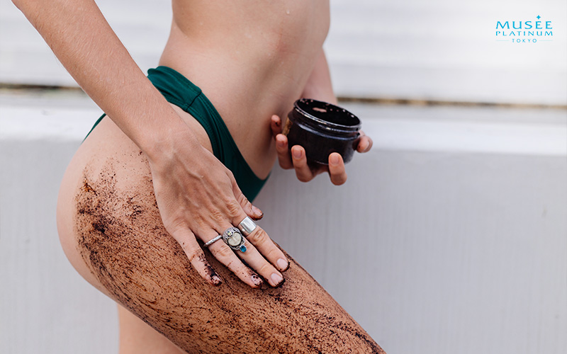 woman-scrubbing-legs-for-exfoliation-and-detoxification